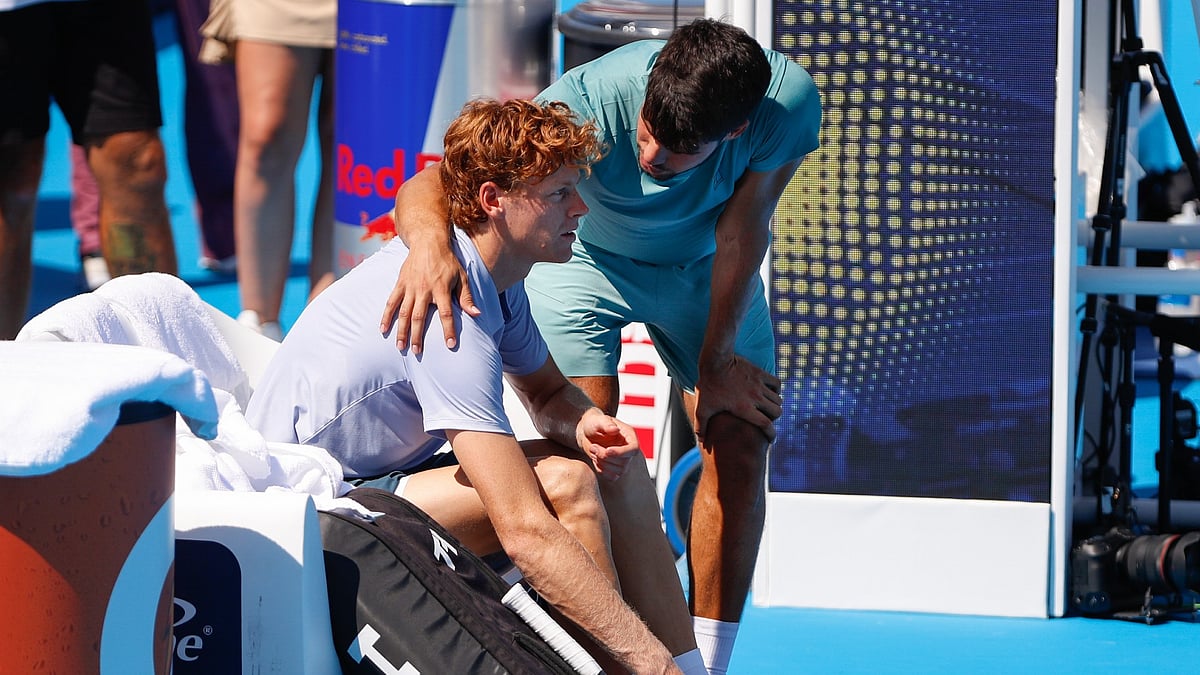 Carlos Alcaraz consoles Jannik Sinner 