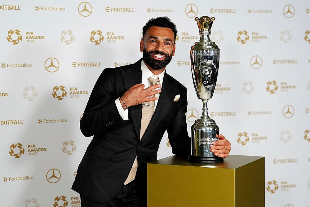 | Photo: Martin Rickett/PA via AP : PFA Awards: Player of the Year Liverpool's Mohamed Salah