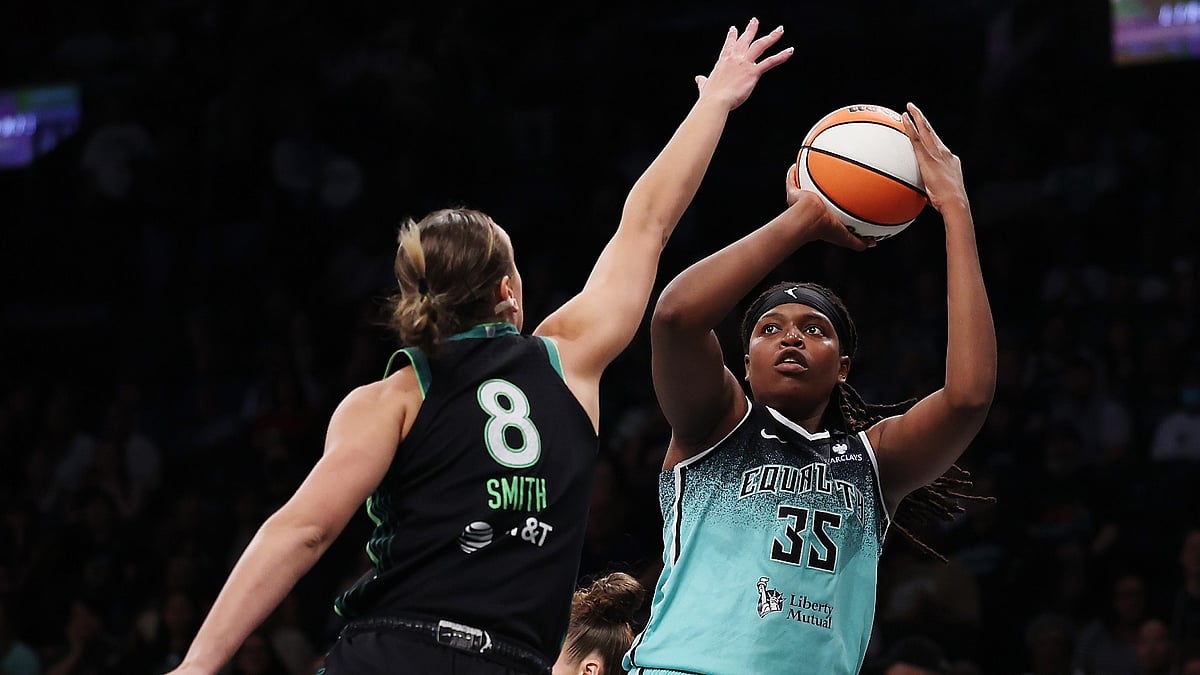 Jonquel Jones #35 of the New York Liberty goes to the basket as Alanna Smith #8 of the Minnesota Lynx defends during the first half at Barclays Center on August 19, 2025 in the Brooklyn borough of New York City.