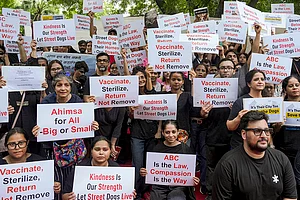 | Photo: PTI/Karma Bhutia : Protest against SC order on stray dogs issue