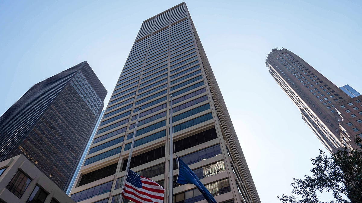 | Photo: AP/Yuki Iwamura : File photo of flags flying on the exterior of 345 Park Ave on July 29, 2025, in New York.