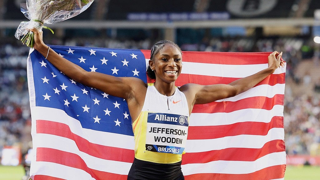 Photo: AP : Brussels Diamond League Live Updates: Melissa Jefferson-Wooden poses after winning the women's 100 metres event.