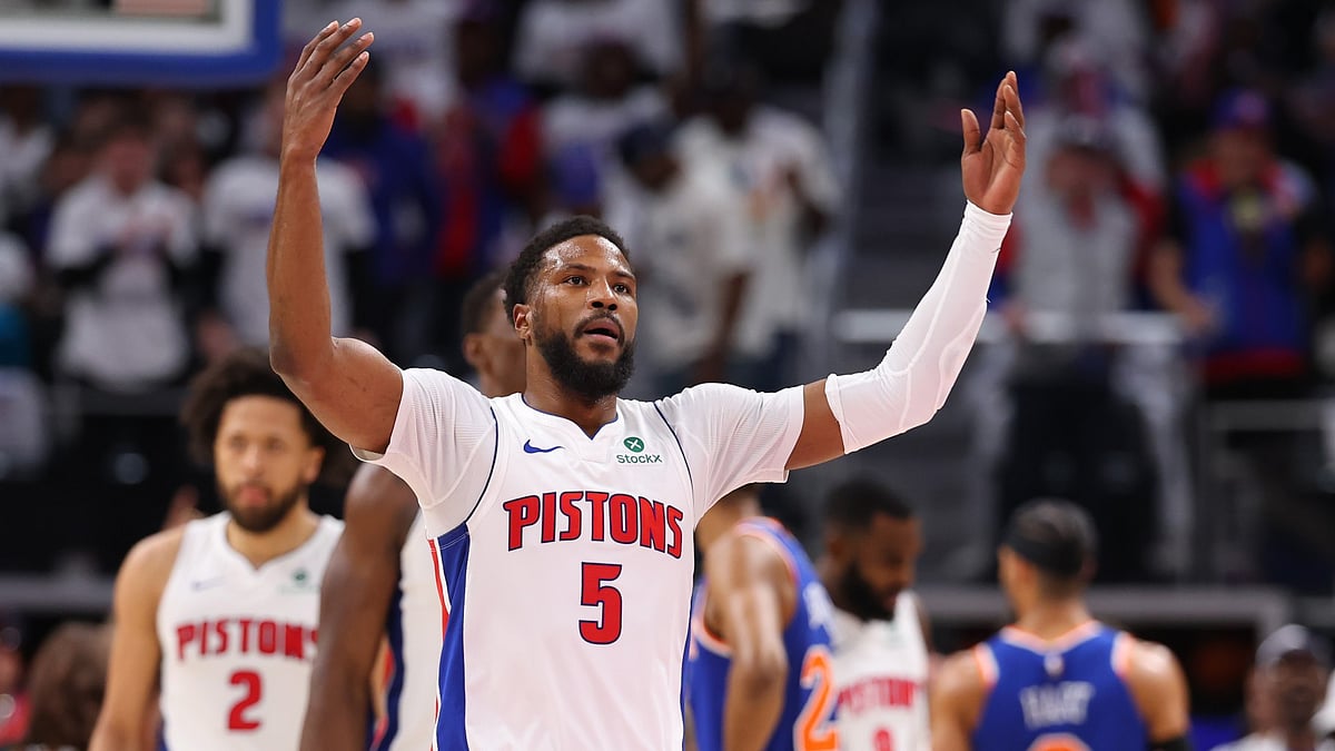 Malik Beasley #5 of the Detroit Pistons celebrates after making a three-point basket at the end of the second quarter against the New York Knicks in Game Six of the Eastern Conference First Round NBA Playoffs at Little Caesars Arena on May 01, 2025 in Detroit, Michigan.