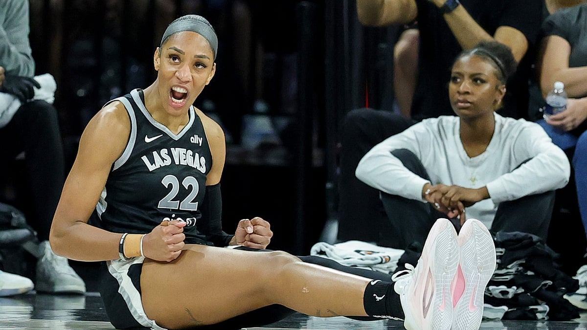 A'ja Wilson #22 of the Las Vegas Aces reacts after drawing a foul against the Atlanta Dream in the third quarter of their game at Michelob ULTRA Arena on August 19, 2025 in Las Vegas, Nevada.
