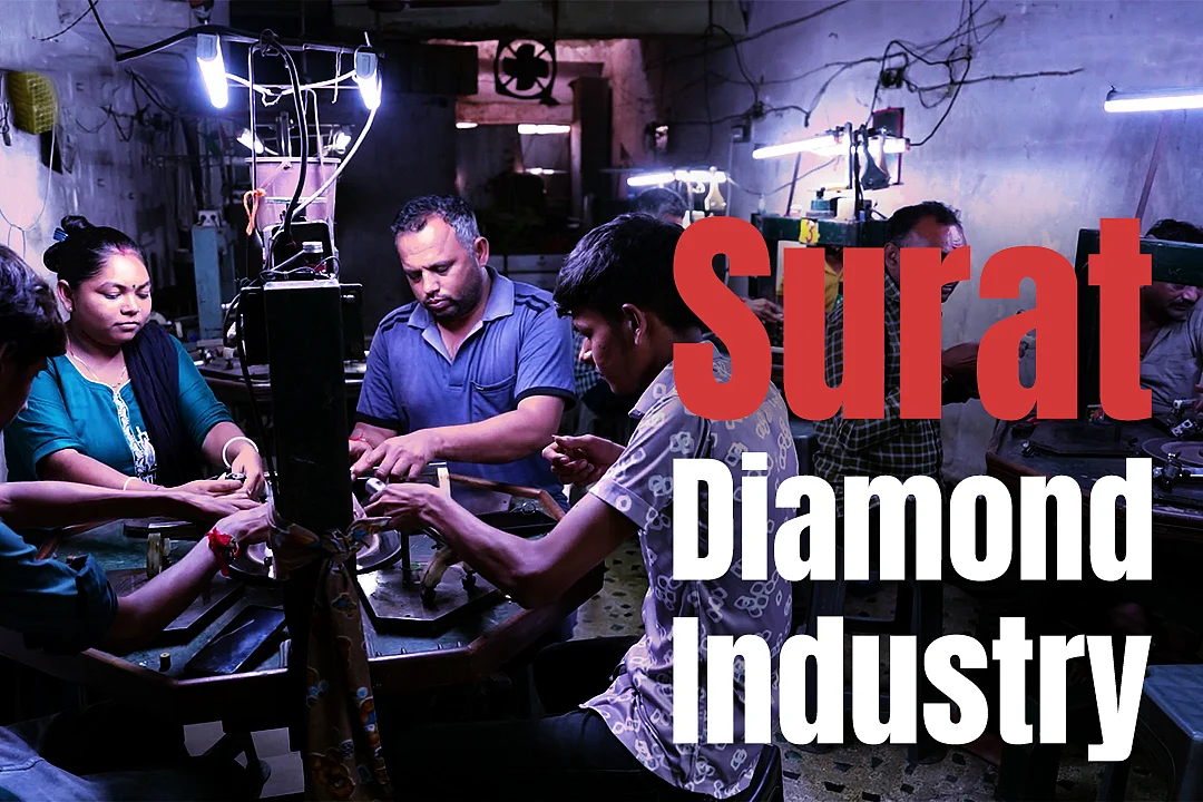 Workers working at a diamond factory in Surat