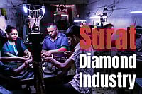 Workers working at a diamond factory in Surat
