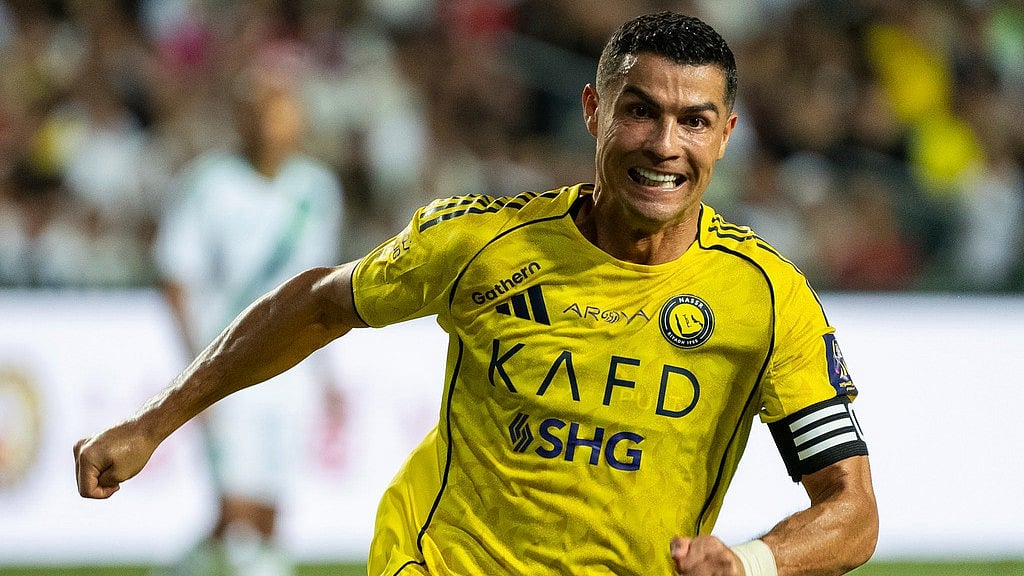 AP : Al Nassr's Cristiano Ronaldo in action during the Saudi Super Cup final against Al Ahli at the Hong Kong Stadium.