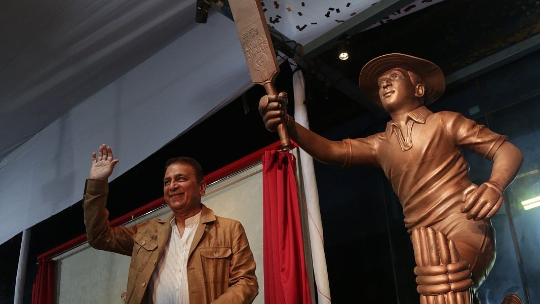 Special Arrangement : Sunil Gavaskar poses alongside his new statue