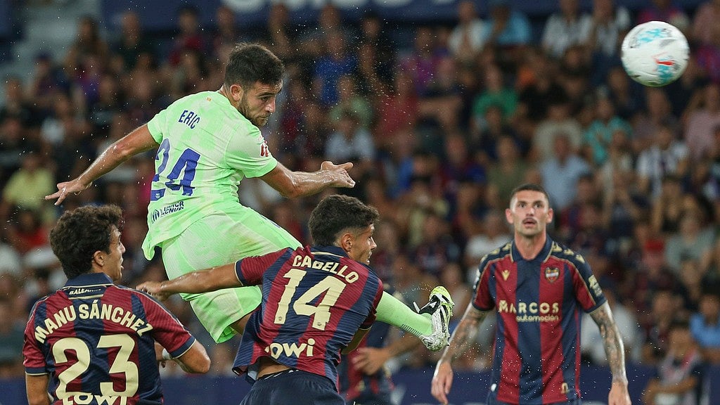 AP : Barcelona's Eric Garcia heads the ball during the La Liga soccer match between Levante and Barcelon in Valencia, Spain, Saturday, Aug. 23, 2025. 