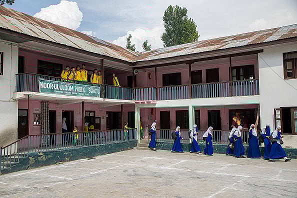 getty images | : Students seen after attending classes at the school linked to Falah-e-Aam Trust on the outskirts of the city. | 
