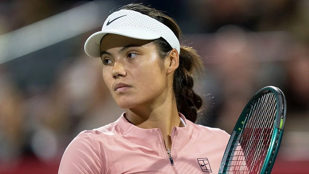 Christinne Muschi/The Canadian Press via AP : File photo of Emma Raducanu in action at Canadian Open.