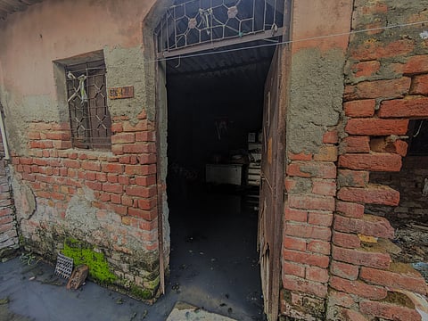 Sewage water seeps into a resident’s home due to the broken drainage system. 