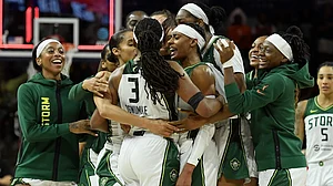 The Seattle Storm congratulate teammate Nneka Ogwumike #3 on her game winning basket against the Washington Mystics after the game at Carefirst Arena on August 24, 2025 in Washington, DC. The Seattle Storm defeated the Washington Mystics 84-82.