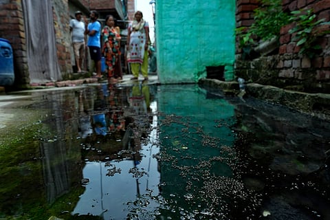Sewage water at the entrance of homes, a breeding ground for insects and mosquitoes, forcing residents to live amid unhygienic conditions. 