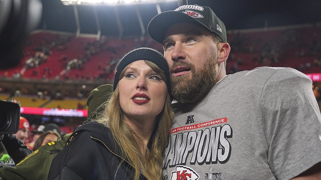 File/AP : Kansas City Chiefs tight end Travis Kelce, right, appears with singer Taylor Swift after the Chiefs victory over the Buffalo Bills in the AFC Championship game in Kansas City in January 2025.