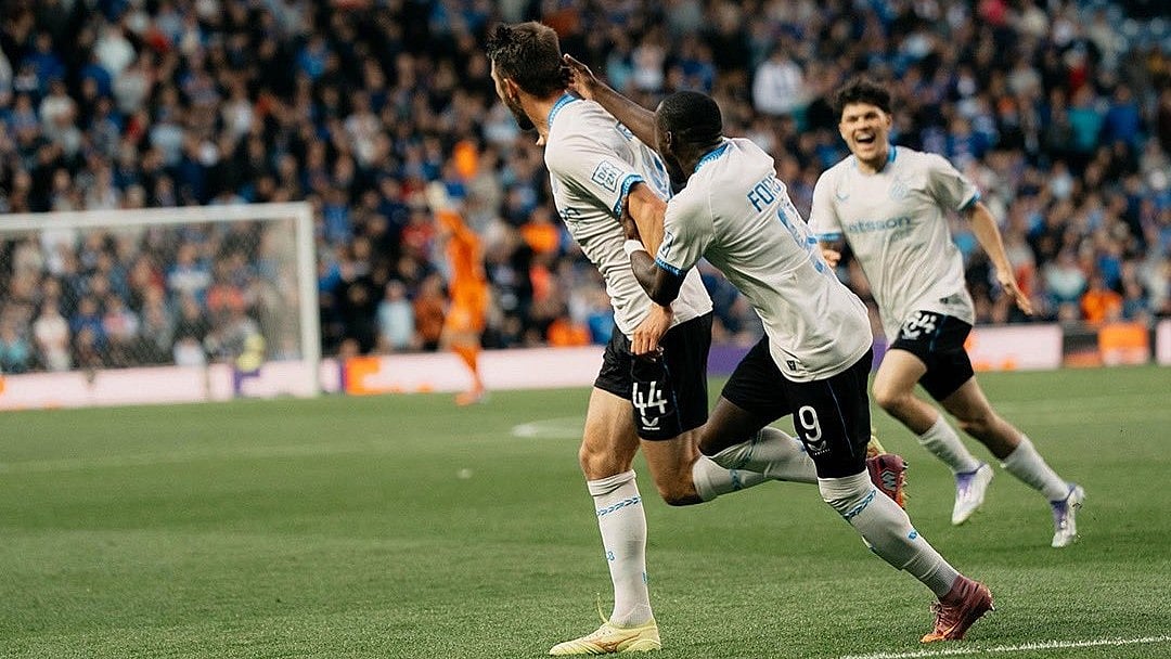 | Photo: X/ClubBrugge : Club Brugge players celebrate after Brandon Mechele's goal against Rangers in the UEFA Champions League 2025-26 playoff first leg.