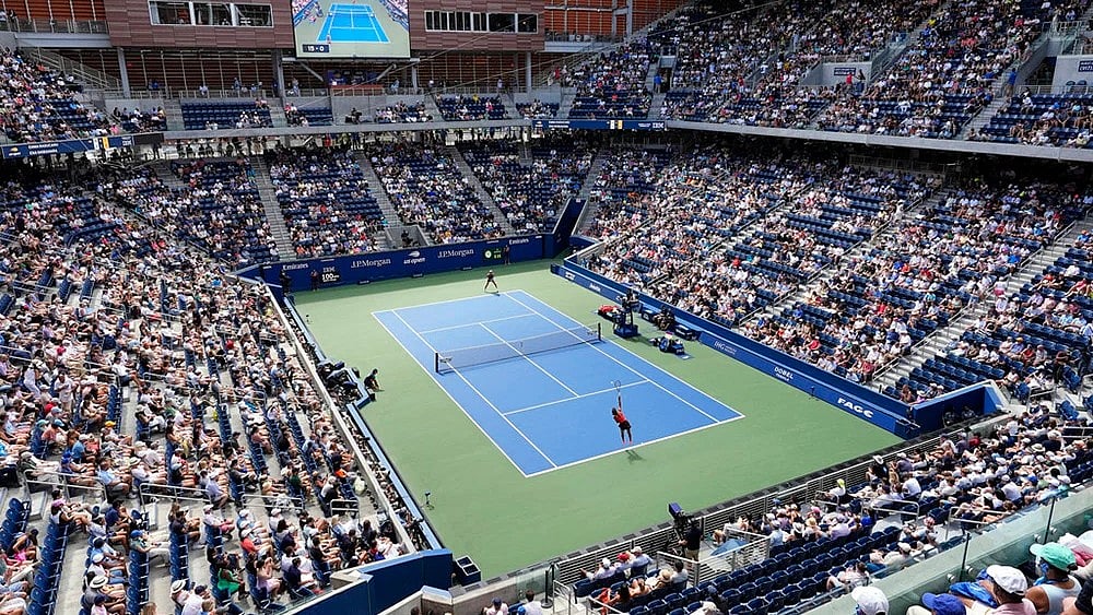 | Photo: AP/Yuki Iwamura : US Open 2025 match taking place at Arthur Ashe Stadium.