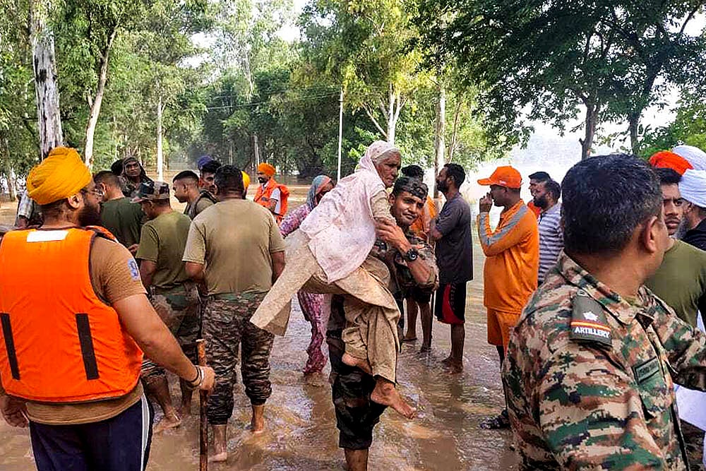 | Photo: PTI : Rain in Amritsar