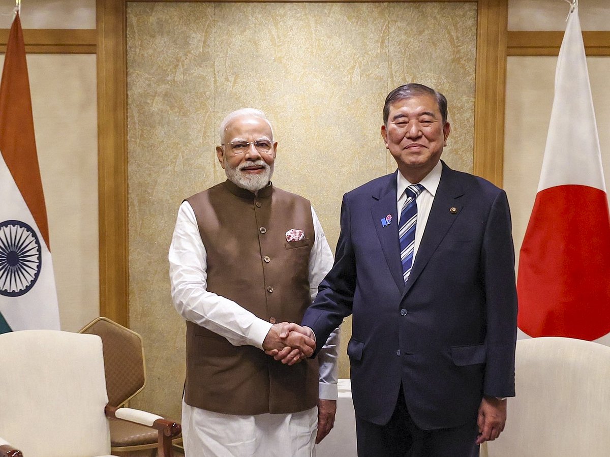 - : In this image posted on Aug. 29, 2025, Prime Minister Narendra Modi with his Japanese counterpart Shigeru Ishiba during the India-Japan Economic Forum, in Tokyo, Japan. (@MEAIndia/X via PTI Photo)