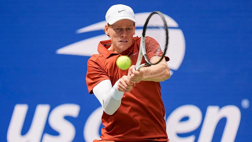 | Photo: AP/Seth Wenig : US Open 2025: Jannik Sinner in action against Alexei Popyrin