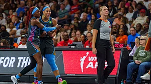 Rhyne Howard #10 holds back Brionna Jones #24 of the Atlanta Dream as she yells at the official during a game between the Dallas Wings and Atlanta Dream at Gateway Center Arena on August 29, 2025 in College Park, Georgia.