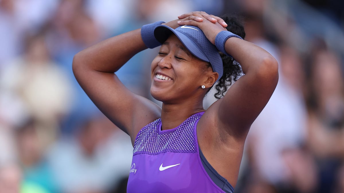 Naomi Osaka celebrates her win