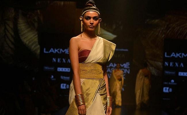 India’s luxury fashion scene where a girl is wearing a traditional attire