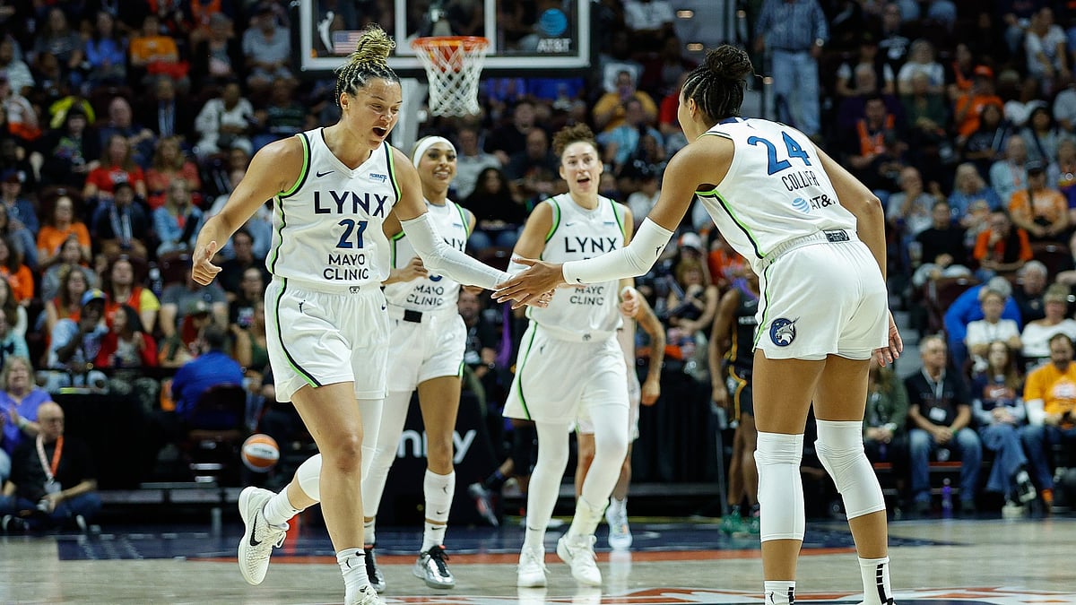 Minnesota Lynx guard Kayla McBride (21) and Minnesota Lynx forward Napheesa Collier (24) react during the WNBA game between Minnesota Lynx and Connecticut Sun on August 30, 2025, at Mohegan Sun Arena in Uncasville, CT.