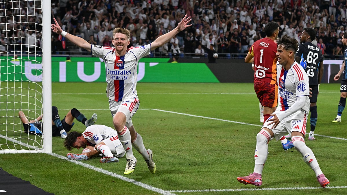 Pavel Sulc leads the Lyon celebrations against Marseille after Leanardo Balerdi's own goal.