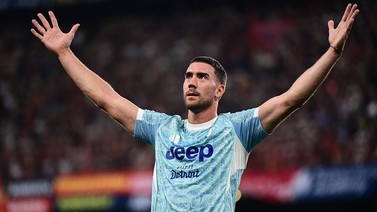 Dusan Vlahovic celebrates after heading home against Genoa.