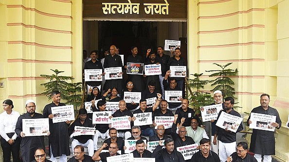 Photo by Santosh Kumar/Hindustan Times via Getty Images : RJD, Congress and CPI-ML legislators demonstrate against SIR during Monsoon Session at Bihar Assembly on July 24, 2025, in Patna. 