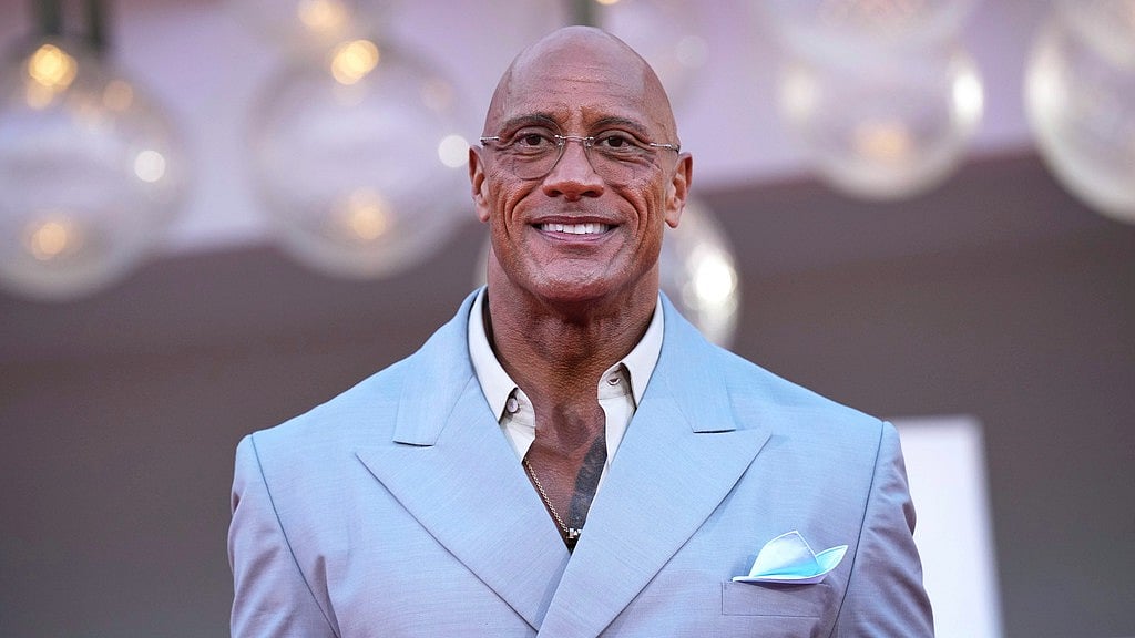 AP/Alessandra Tarantino : Dwayne Johnson poses for photographers on the red carpet for the film 'The Smashing Machine' during the 82nd edition of the Venice Film Festival in Venice, Italy, on Monday, Sept. 1, 2025.