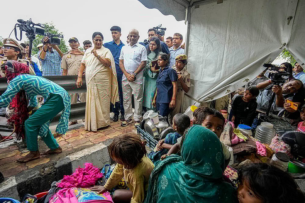 | Photo: PTI/Salman Ali : Rekha Gupta visits Yamuna floodplain near Geeta Colony