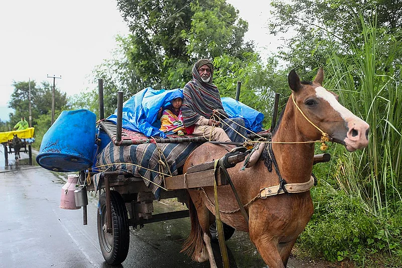 Flood-affected people move to safer place in Jammu district
