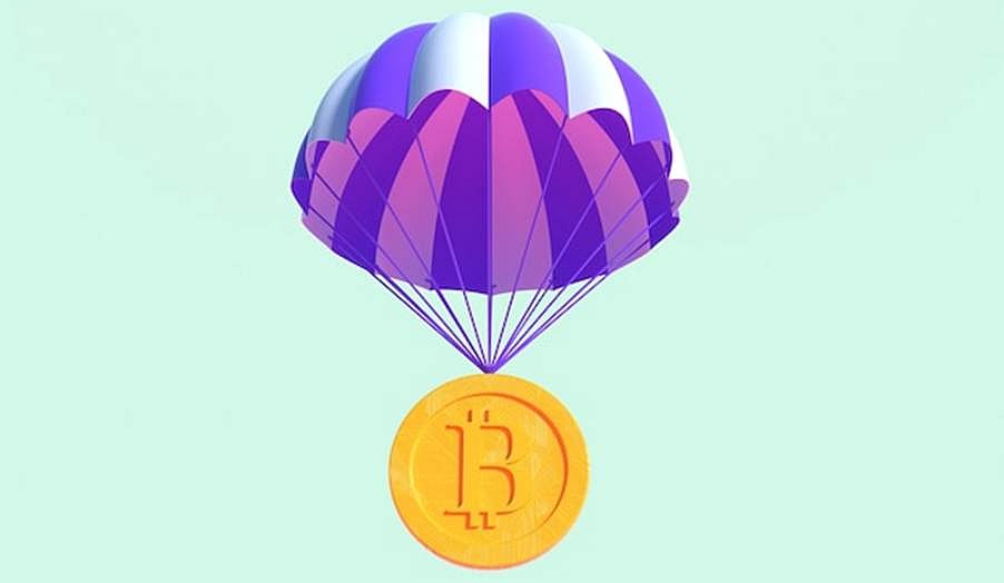Crypto Airdrop and Bitcoin logo with parachute