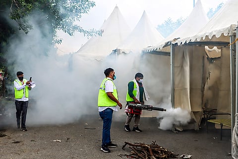 MCD workers fumigate flood relief camp in Delhi