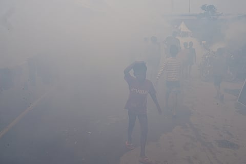 Mosquito repellant smoke being spread across the camp to safeguard the displaced from monsoonal diseases due stagnant Yamuna water. 
