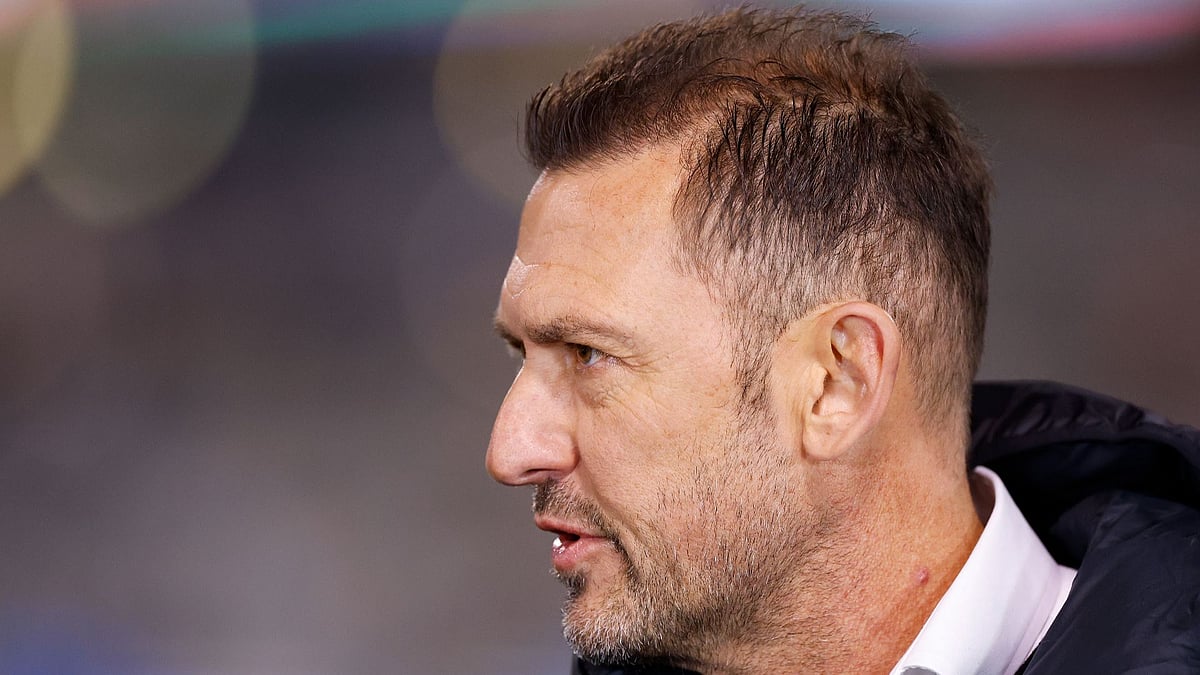 Tony Popovic on the touchlines for Australia against New Zealand.