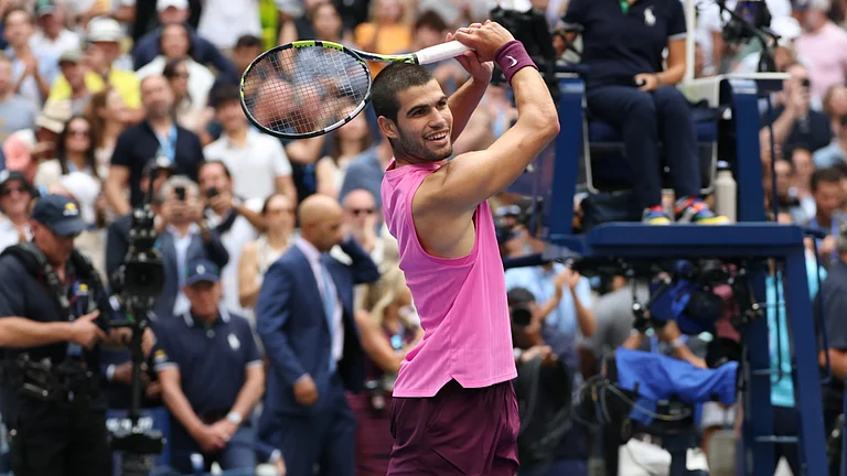 Carlos Alcaraz in actoion in the US Open 2025. - null