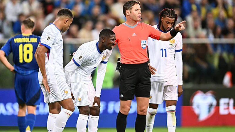 Dembele clutches hamstring