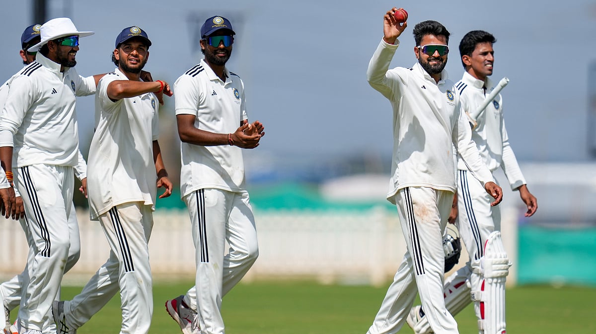 PTI : Central Zone's Saransh Jain shows the ball after taking five wickets on the final day of the Duleep Trophy 2025 semi-final against West Zone in Bengaluru.