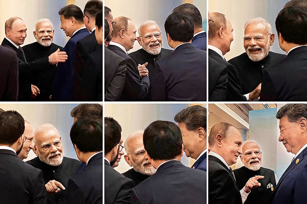 | Photo: AP : Three is Company: Modi, Putin and 
Xi at the SCO summit in China 