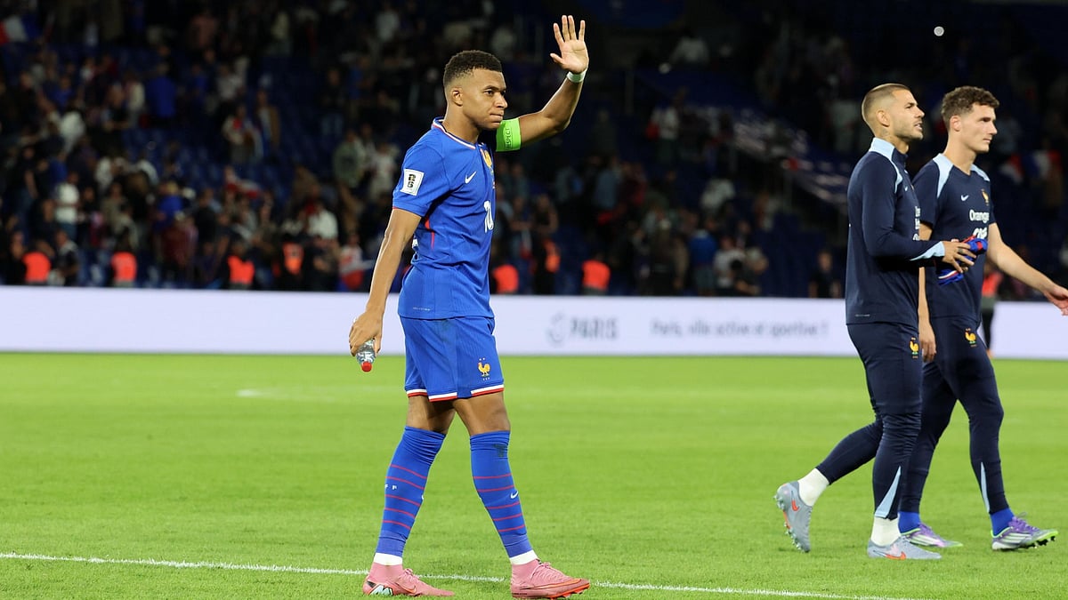 Kylian Mbappe waves to France's supporters after the win over Iceland.