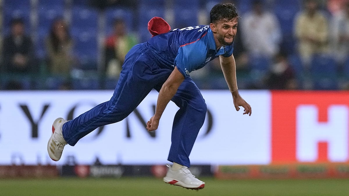 | Photo: AP/Fatima Shbair : Afghanistan's Azmatullah Omarzai bowls a delivery.