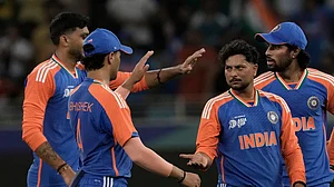 (AP Photo/Fatima Shbair) : India's Kuldeep Yadav, second right, celebrate the wicket of United Arab Emirates's Rahul Chopra during the Asia Cup Cricket match between United Arab Emirates and India at Dubai International Cricket stadium in Dubai, United Arab Emirates, Wednesday, Sept. 10, 2025.