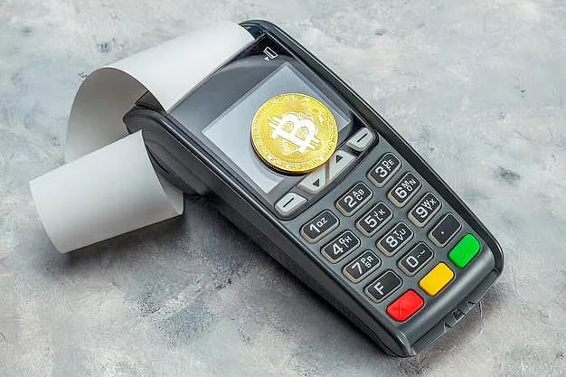 Bitcoin POS terminal with Bitcoin coin on screen