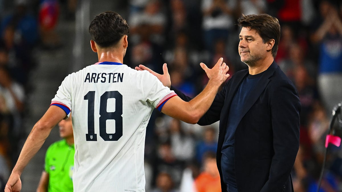 United States boss Mauricio Pochettino shares a handshake with Max Arfsten
