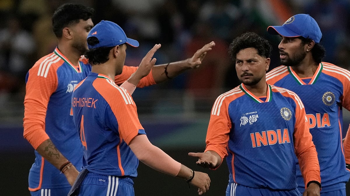 | Photo: AP/Fatima Shbair : India's Kuldeep Yadav, second right, celebrate the wicket of United Arab Emirates's Rahul Chopra during the Asia Cup Cricket match between United Arab Emirates and India at Dubai International Cricket stadium in Dubai, United Arab Emirates, Wednesday, Sept. 10, 2025.