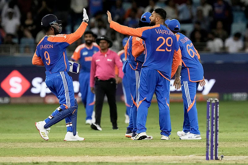 India Vs UAE Asia Cup Cricket 2025, Match 2 photos_Varun Chakravarthy