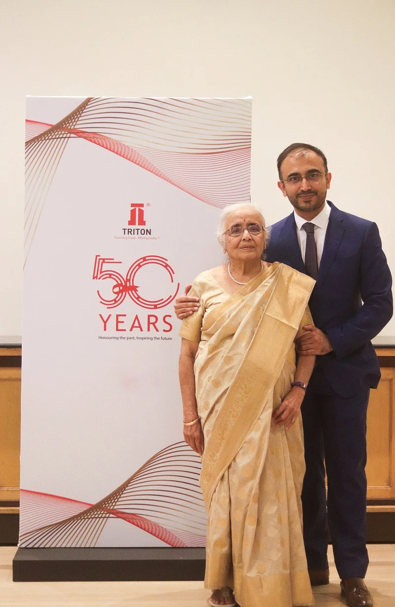 Anuradha M. Gokarn & Aditya M. Gokarn standing together
